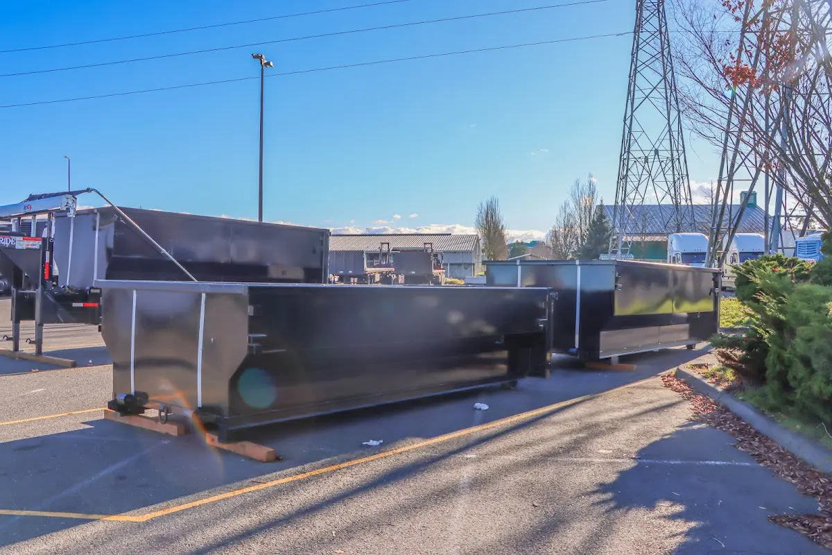 Roll-off dumpster ready for waste disposal at job site for 12 Yard Dumpster Rental in Osage Beach
